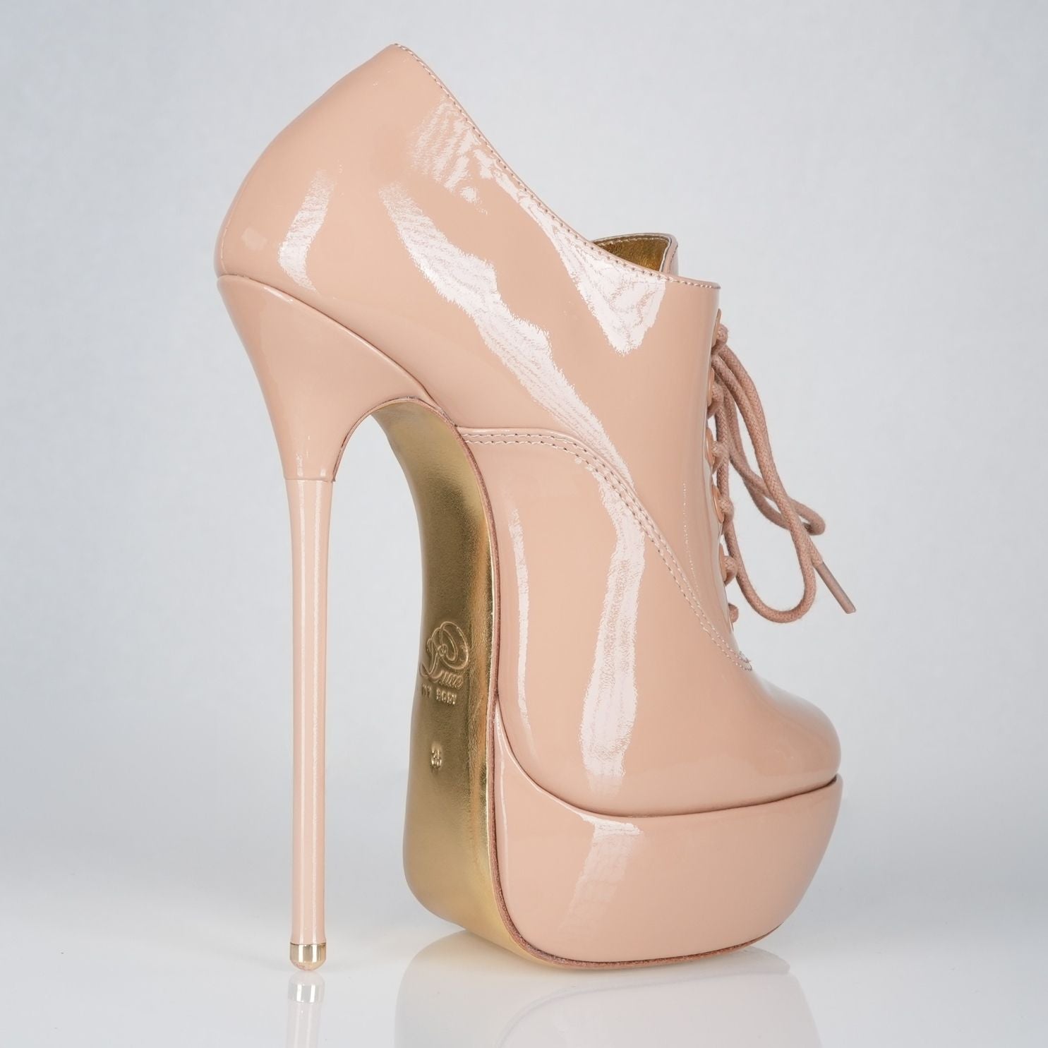 Empress beige patent high heel oxfords with 160mm (6 inch) Superarch stiletto high heels, extreme super arch back right view.