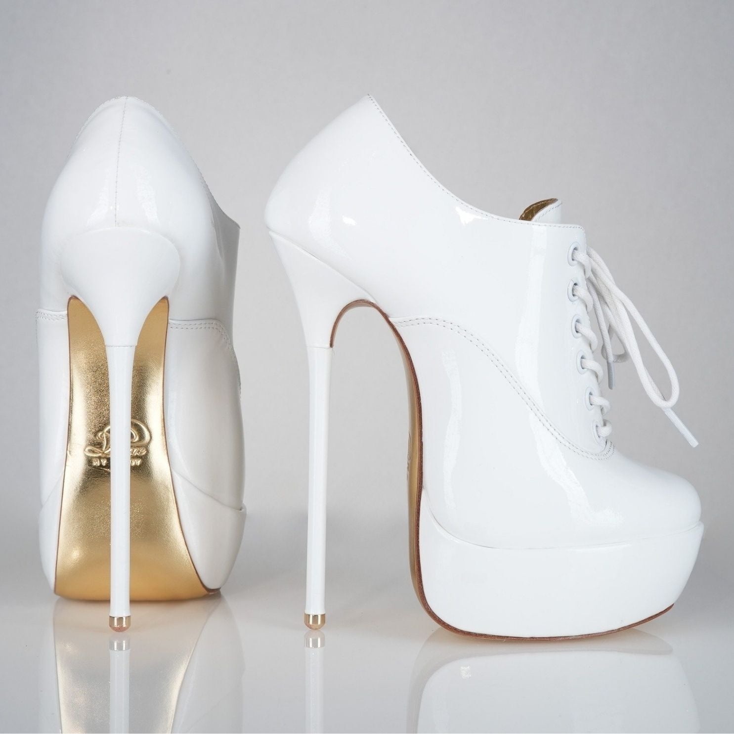 Empress white patent high heel oxfords with 160mm (6 inch) Superarch stiletto high heels, ultra high heels with super arch profile view.