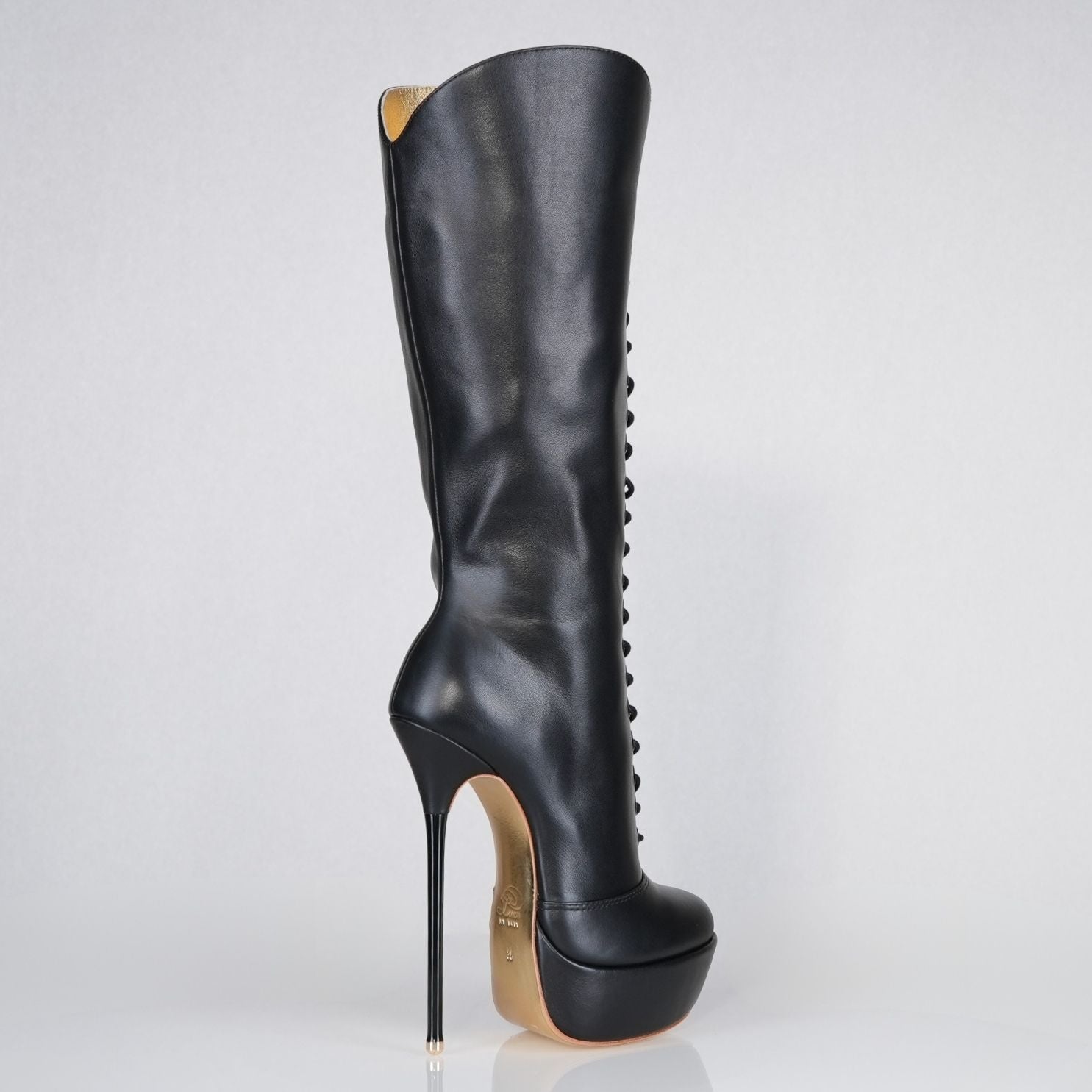 Mistress black leather high heel knee-boots with 160mm (6 inch) Superarch stiletto high heels, extreme super arch back right view.