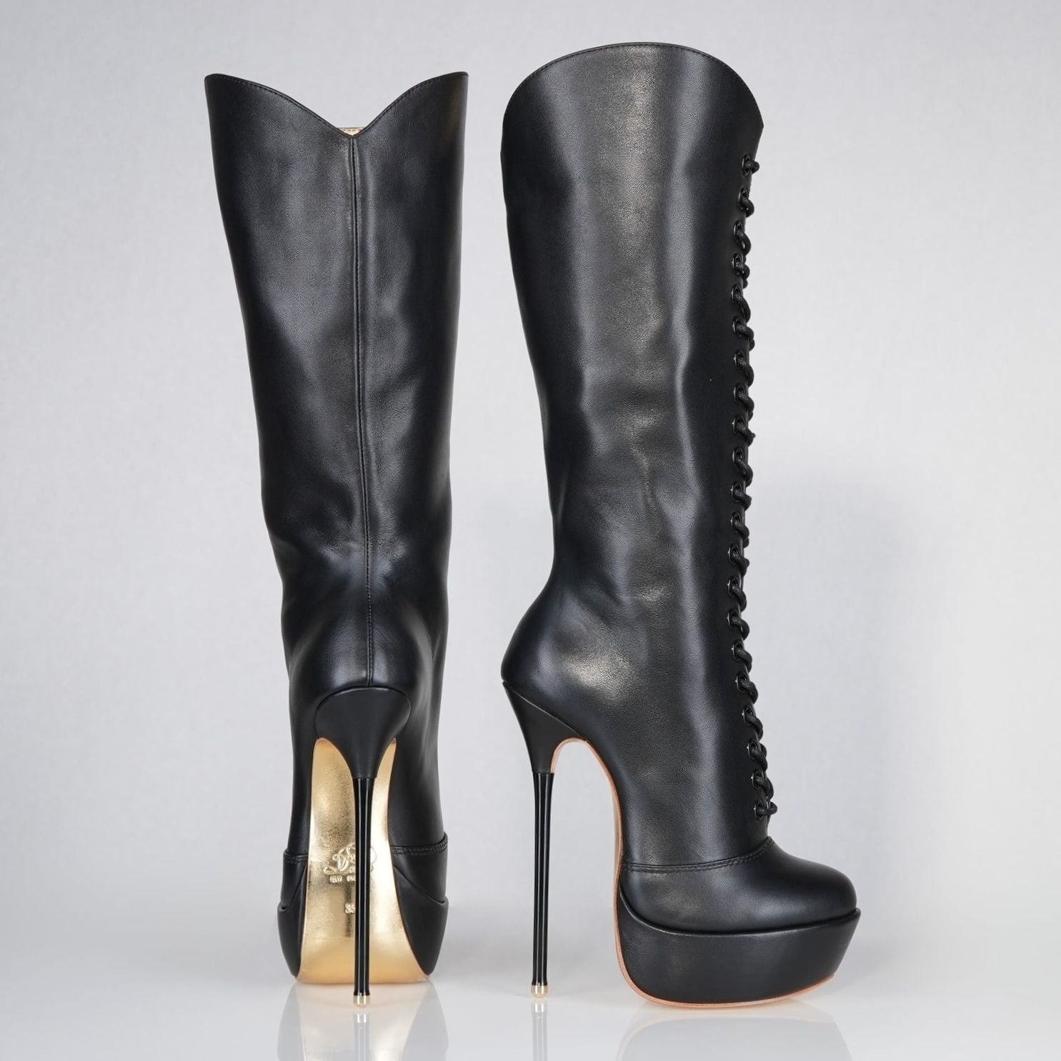 Mistress black leather high heel knee-boots with 160mm (6 inch) Superarch stiletto high heels, ultra high heels with super arch profile view.