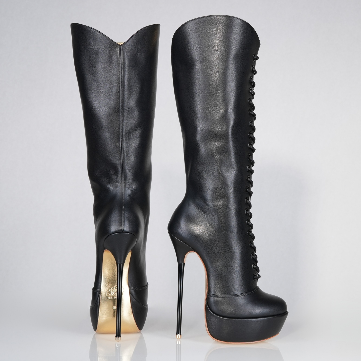 Mistress black leather high heel knee-boots with 160mm Superarch high heels, profile view.