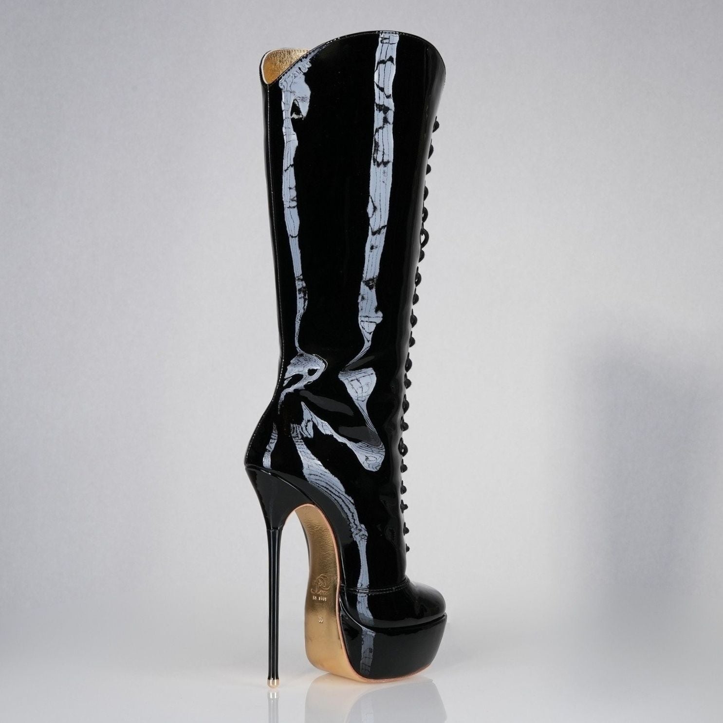 Mistress black patent high heel knee-boots with 160mm (6 inch) Superarch stiletto high heels, extreme super arch back right view.
