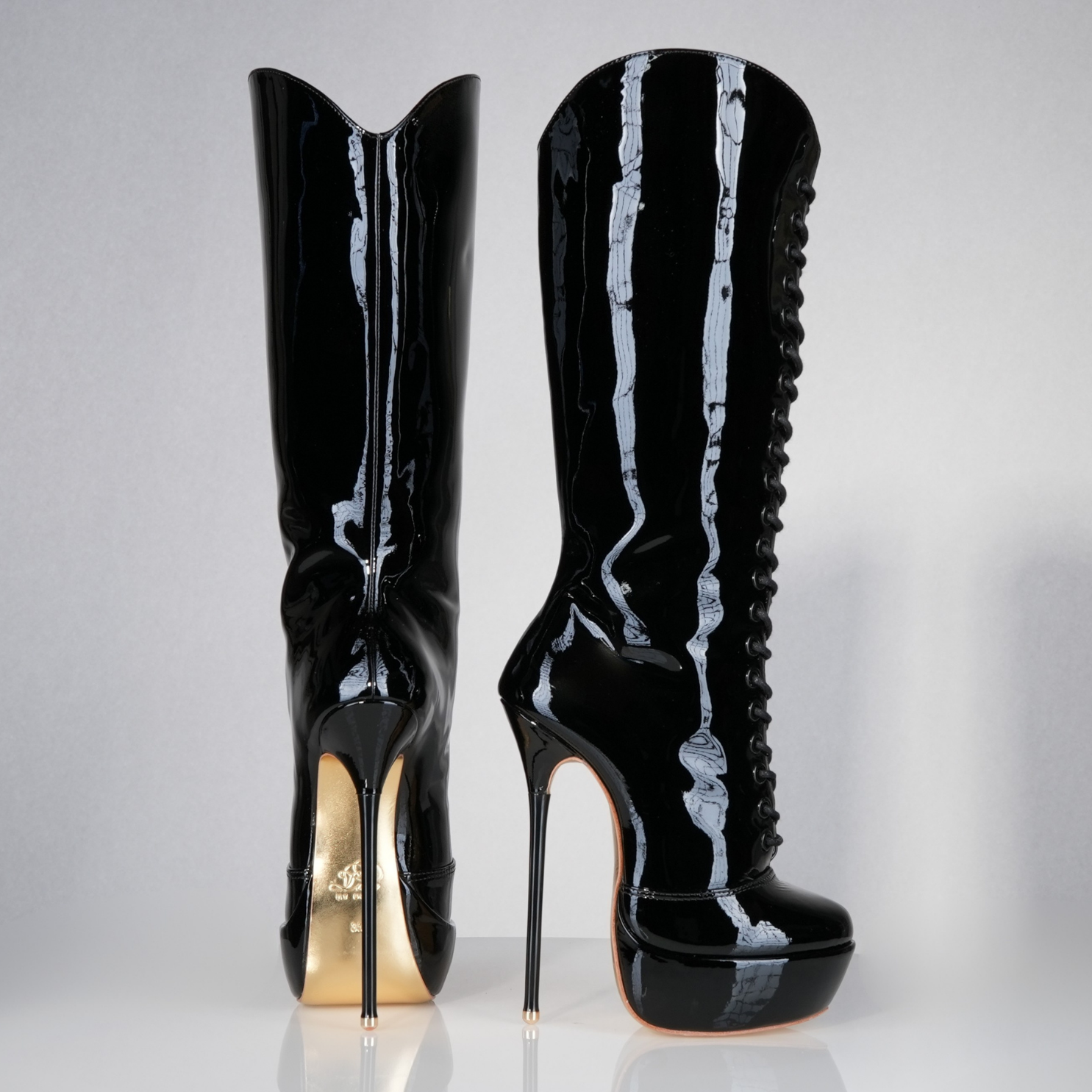Mistress black patent high heel knee-boots with 160mm Superarch high heels, profile view.