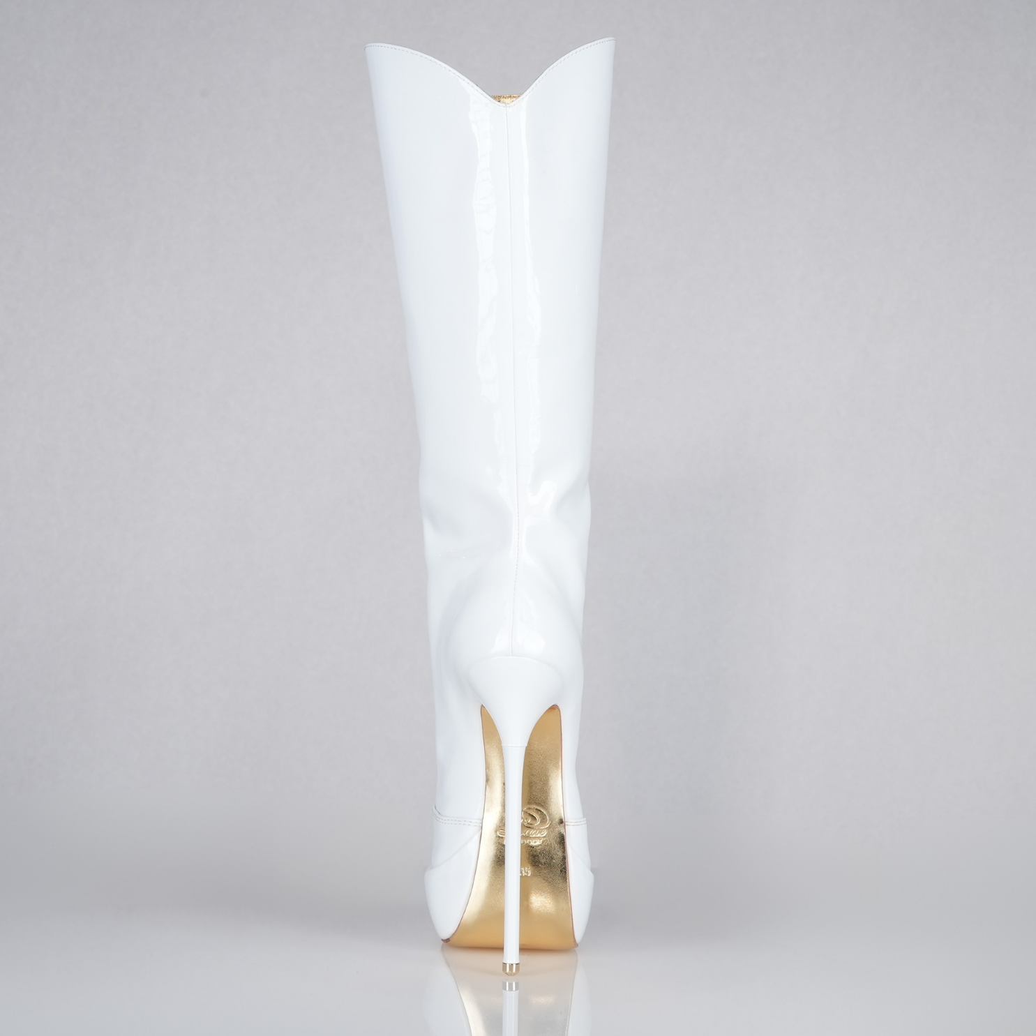 Mistress white patent high heel knee-boots with 160mm Superarch stiletto high heels, back view.