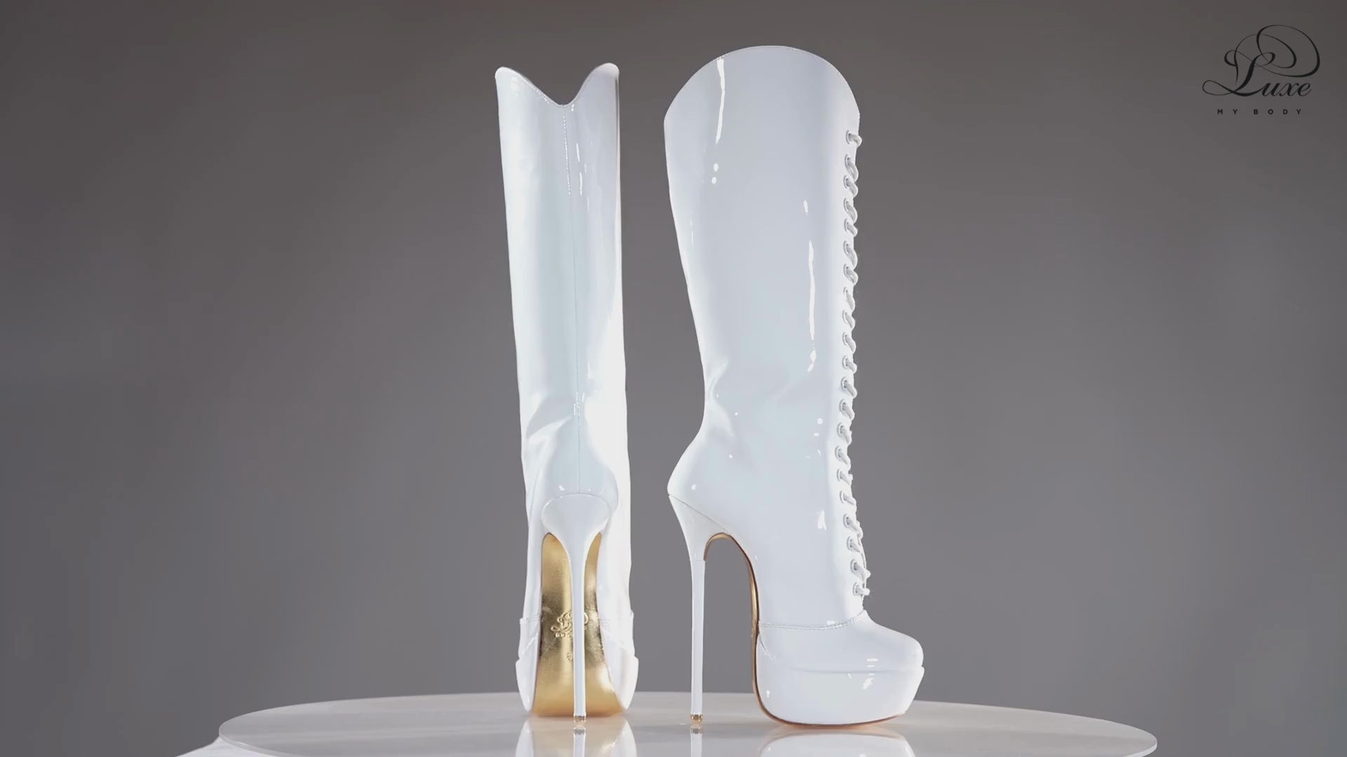White patent 160mm stiletto high heel knee boots, round metal tips, extreme 90 degree superarch, Mistress Collection, 360 view.