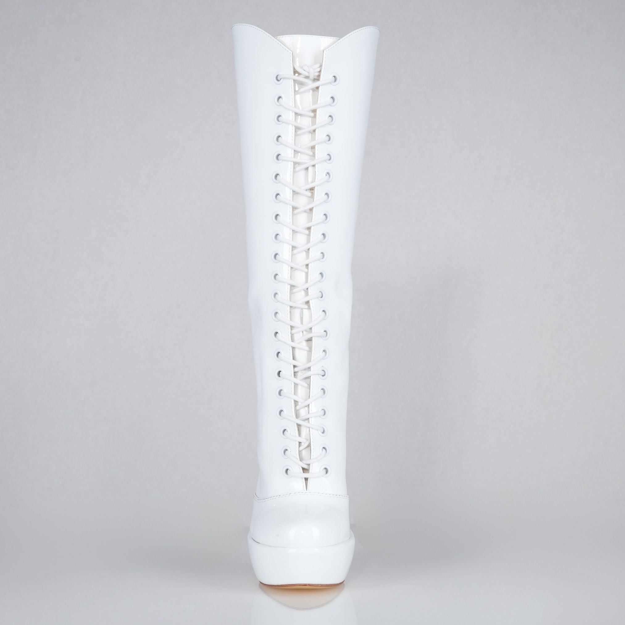 White patent 160mm stiletto high heel knee boots, round metal tips, extreme 90 degree superarch, Mistress Collection, front view.