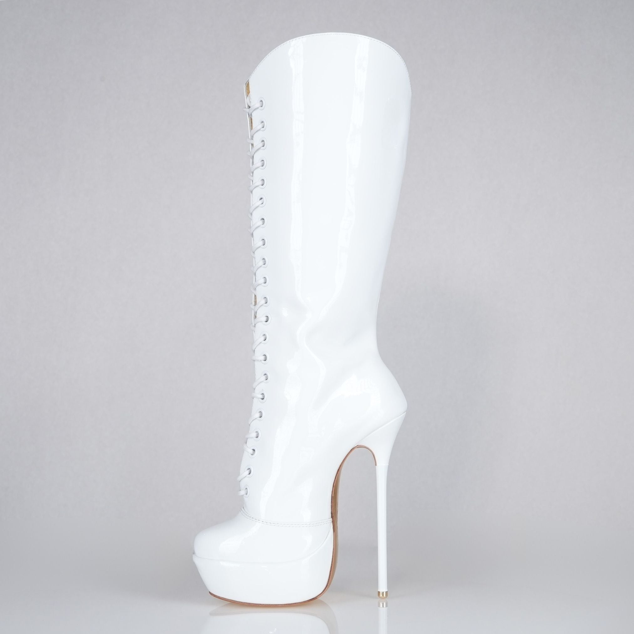 White patent 160mm stiletto high heel knee boots, round metal tips, extreme 90 degree superarch, Mistress Collection, left view.
