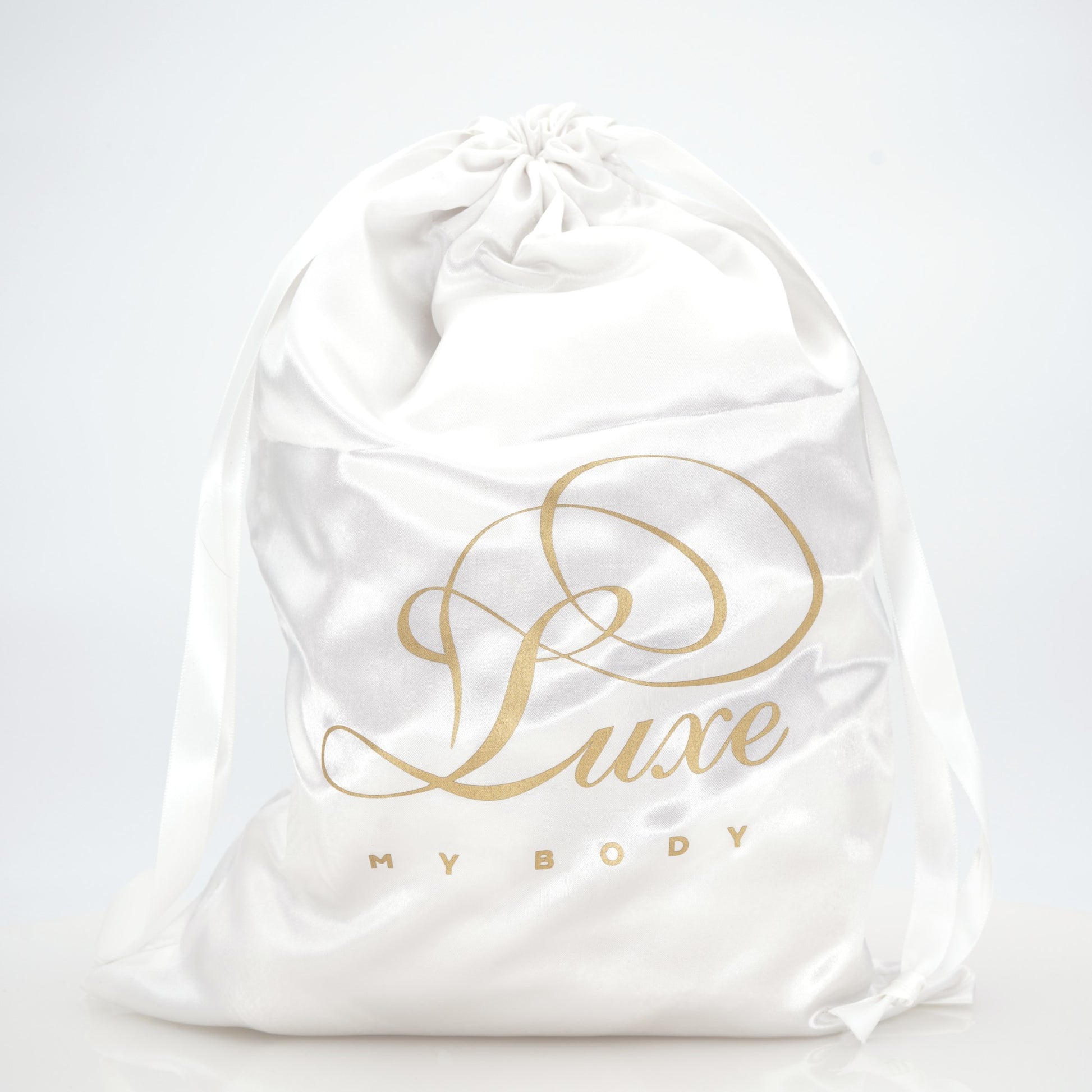 White high heel shoe satin dust bag from Luxe My Body.  Made by high end luxury shoe designer Carrie LaChance.