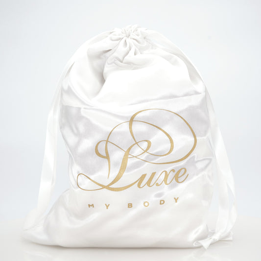 White high heel shoe satin dust bag from Luxe My Body.  Made by high end luxury shoe designer Carrie LaChance.